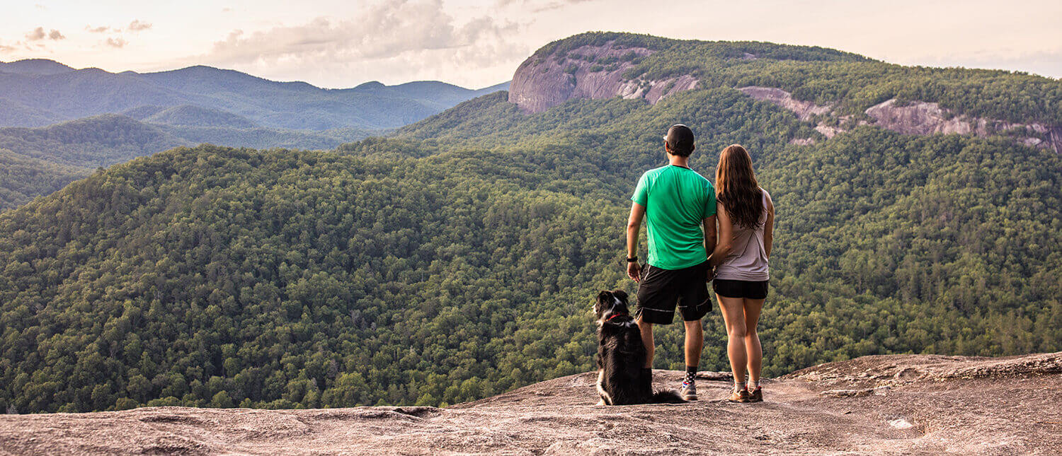 COUPLE W DOG HIKE LOOKOUT5 e1711983768475-explore-brevard