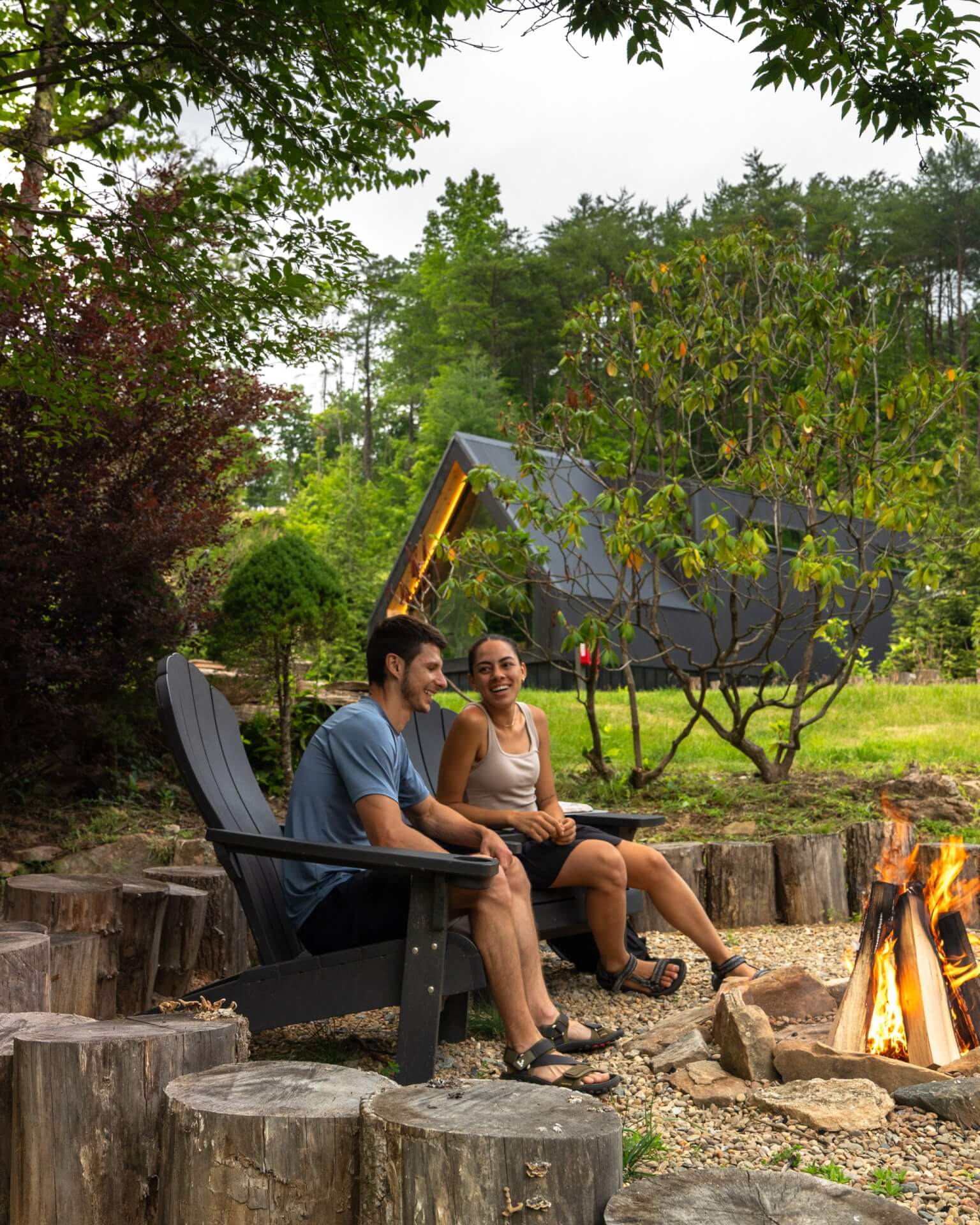 Couple sitting by the fire pit at Valley Bear Farms