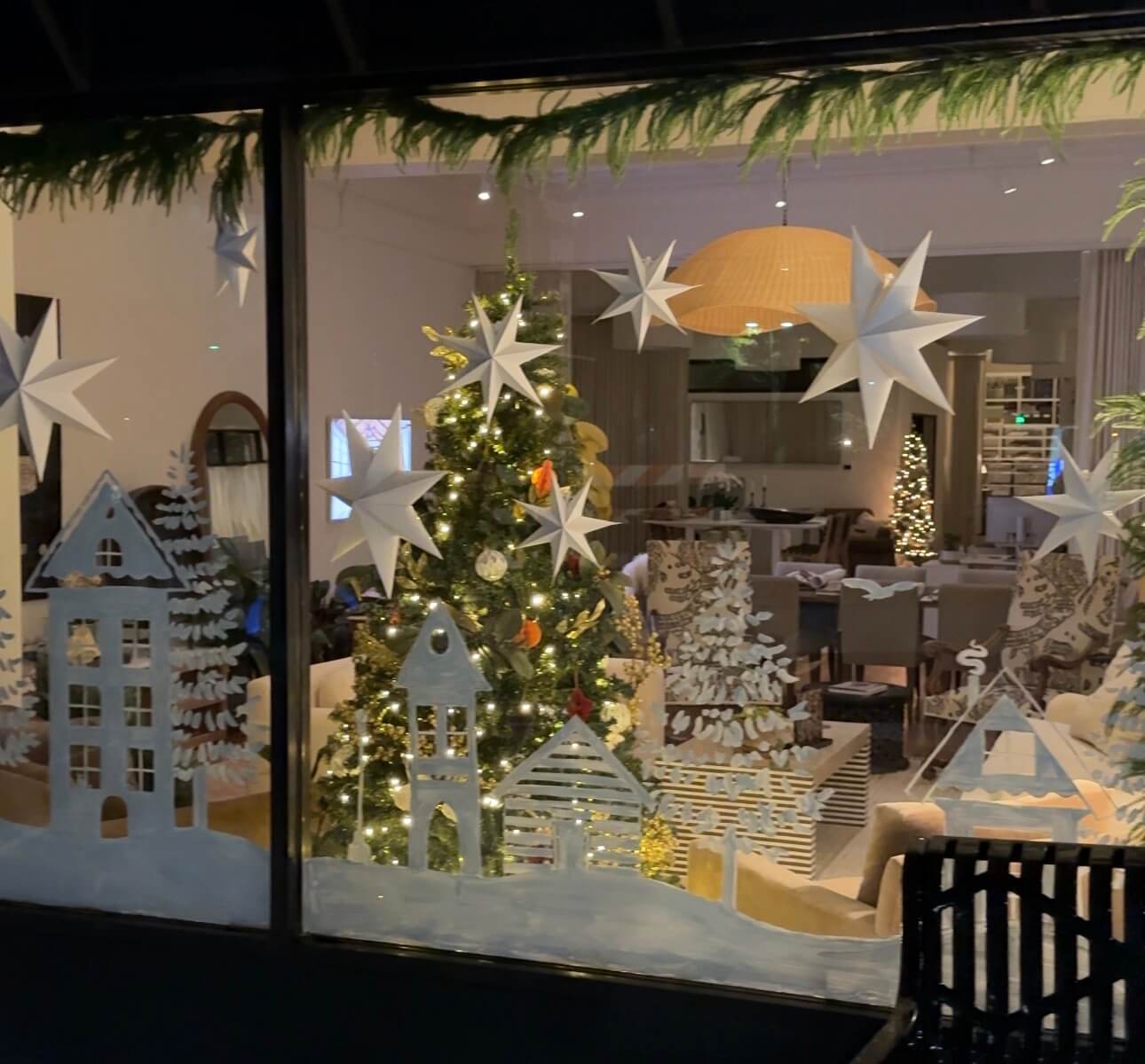 Holiday window display decorated for the Holiday Windows Competition at Platt Home in Downtown Brevard