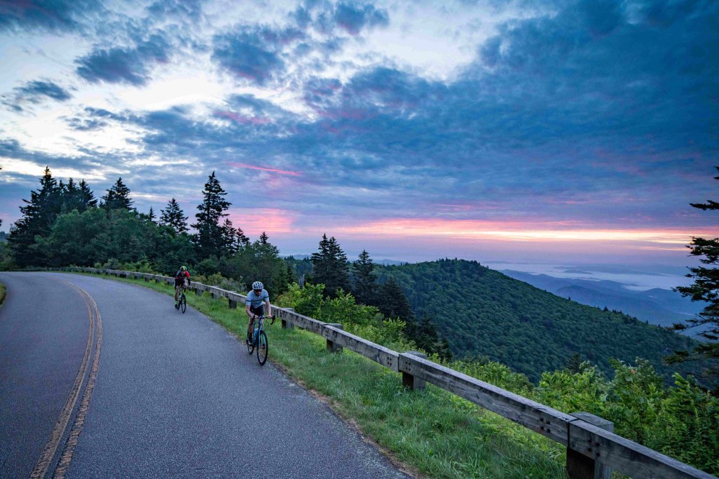 Cyclists' road cycling at sunset on the Blue Ridge Parkway in Pisgah National Forest.