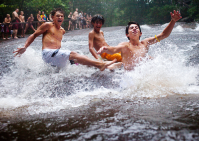 3 boys enjoying Sliding Rock Waterfalls in Brevard NC