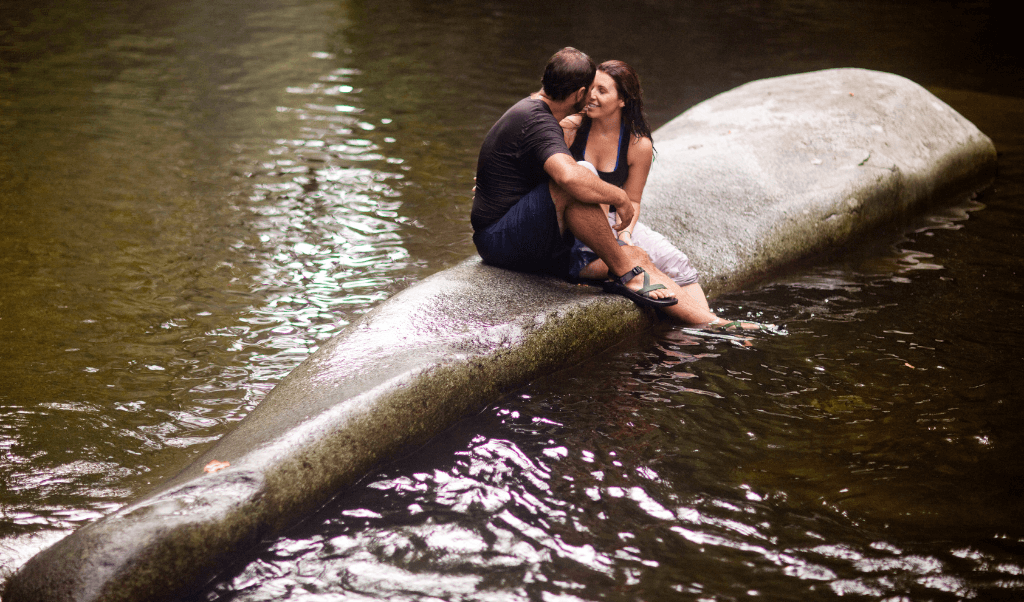 Couple at Whale Back swimming hole in Pisgah National Forest