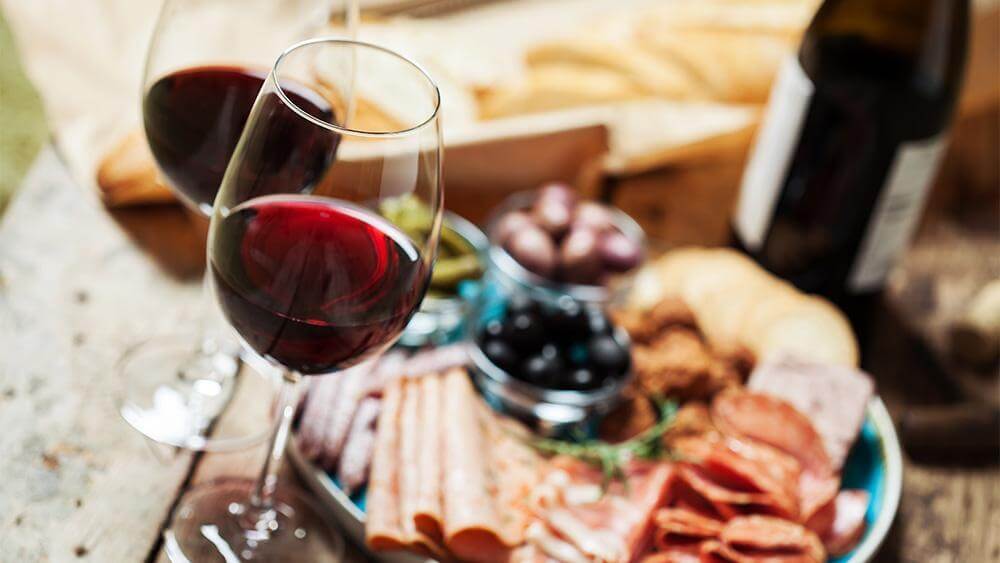 Wine and a charcuterie board.