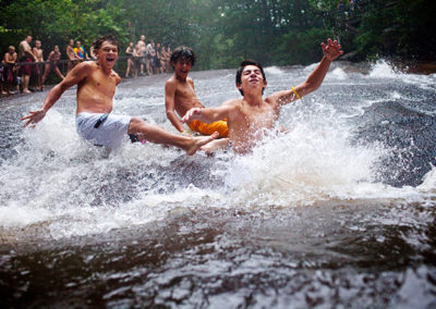 3 boys enjoying Sliding Rock Waterfalls in Brevard NC